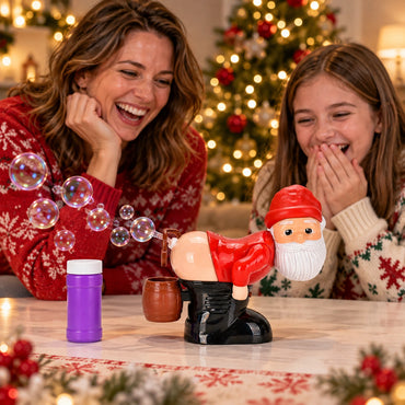 Mother and teenage daughter laughing beside a small Santa bubble machine at a Christmas table